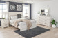 Stelsie Queen Panel Bed with Mirrored Dresser and Nightstand